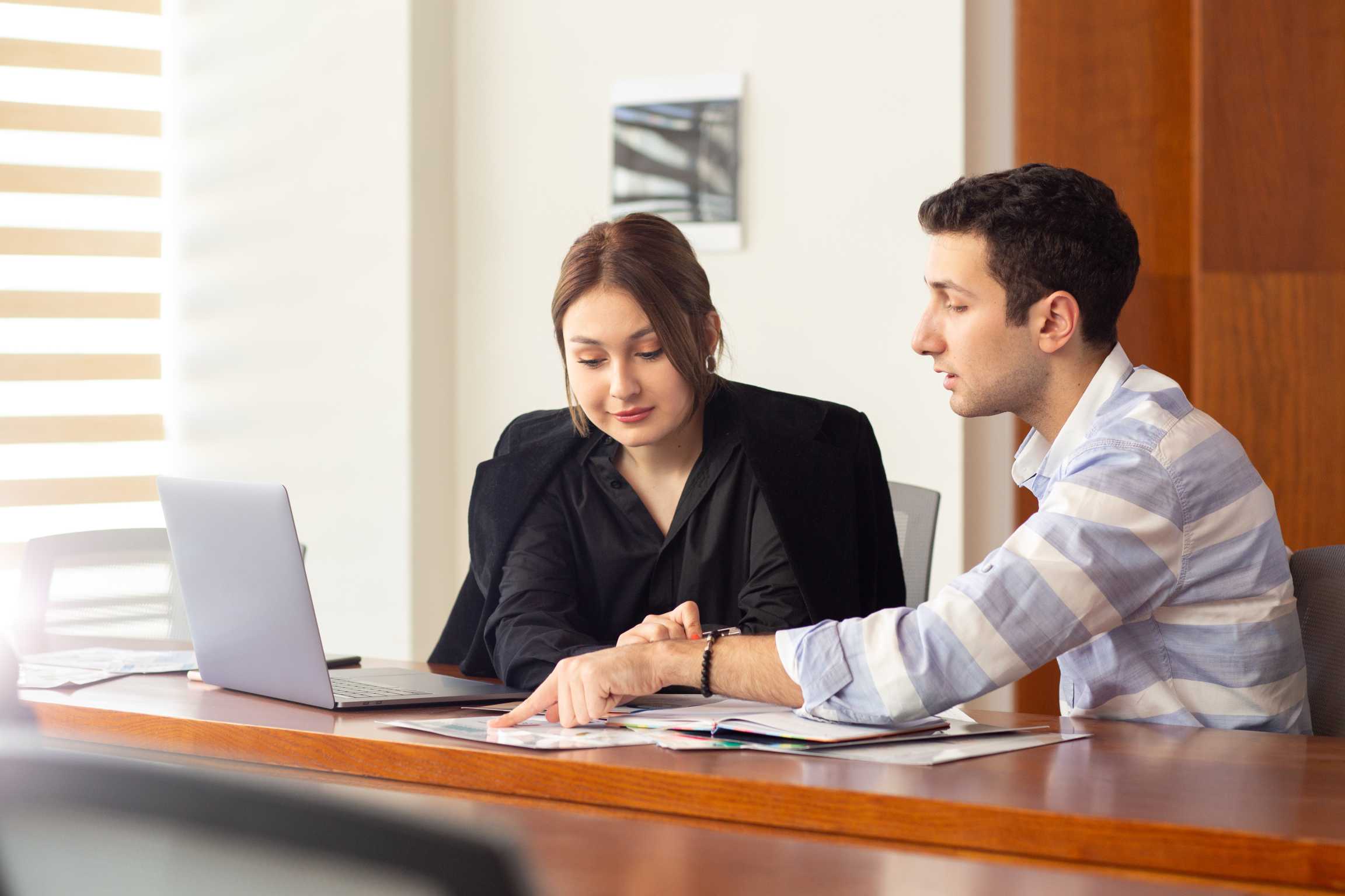 Company registration in delhi startup founders reviewing documents
